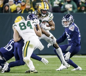 Tennessee Titans wide receiver Robert Woods (2) catches a pass as Green Bay  Packers linebacker Krys Barnes (51) defends during the second half of an  NFL football game Thursday, Nov. 17, 2022