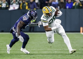 Tennessee Titans wide receiver Robert Woods (2) catches a pass as Green Bay  Packers linebacker Krys Barnes (51) defends during the second half of an  NFL football game Thursday, Nov. 17, 2022